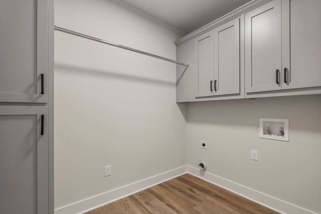 299 Ridgeway Drive Cataula, GA 31804 - Photo 22 of 52 a view of a closet with wooden floor