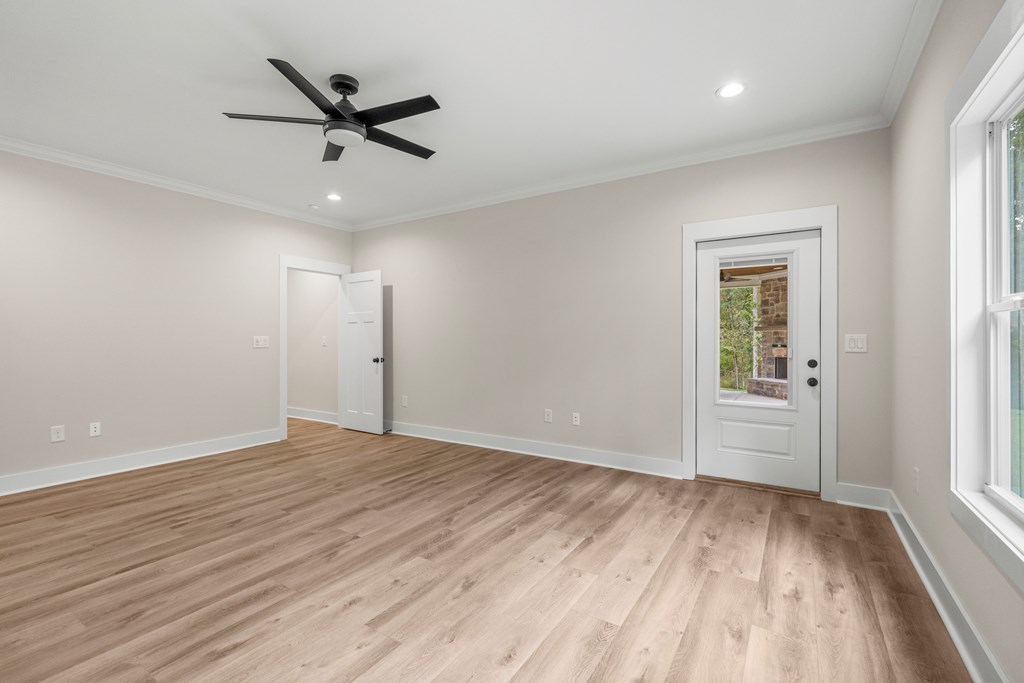299 Ridgeway Drive Cataula, GA 31804 - Photo 25 of 52 wooden floor in an empty room with a window