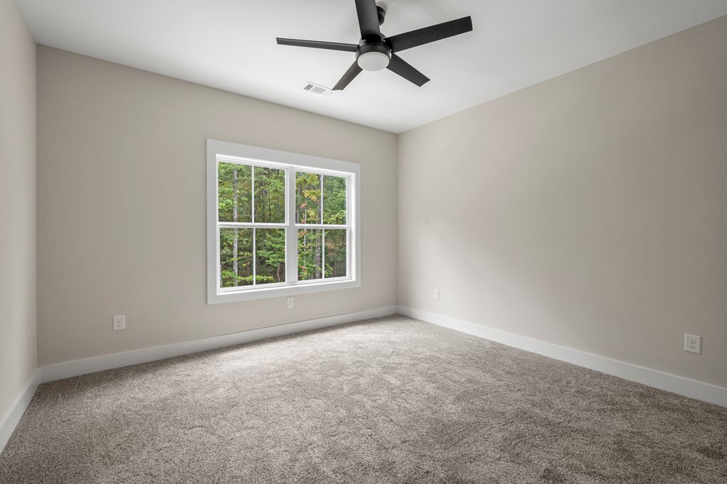 299 Ridgeway Drive Cataula, GA 31804 - Photo 32 of 52 an empty room with a window
