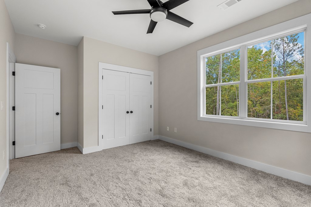 299 Ridgeway Drive Cataula, GA 31804 - Photo 37 of 52 a view of an empty room with a window