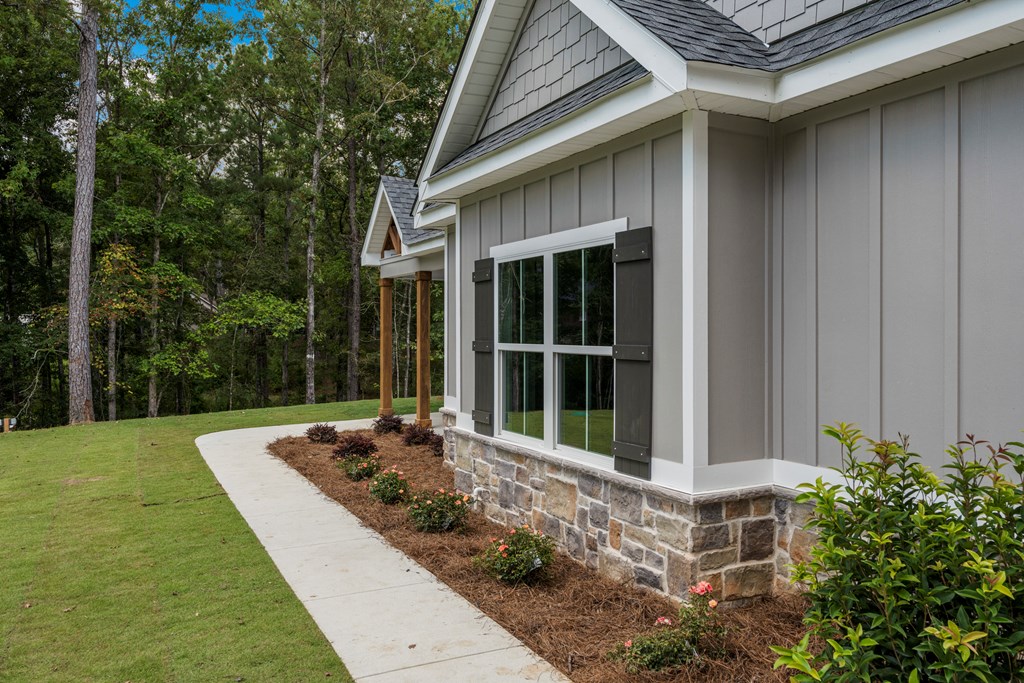 299 Ridgeway Drive Cataula, GA 31804 - Photo 4 of 52 a front view of a house with garden
