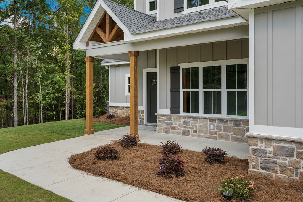 299 Ridgeway Drive Cataula, GA 31804 - Photo 5 of 52 a front view of a house with garden