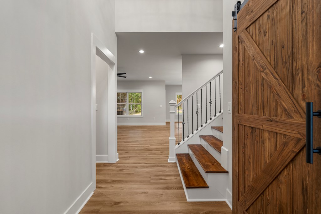 299 Ridgeway Drive Cataula, GA 31804 - Photo 7 of 52 a view of entryway and hall with wooden floor