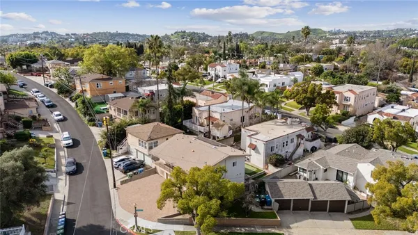 an aerial view of a city with lots of residential buildings