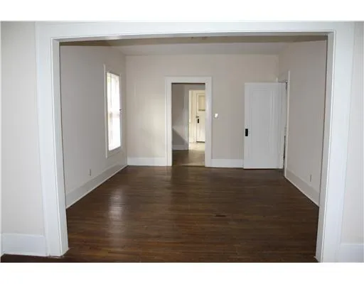 a view of an empty room and window