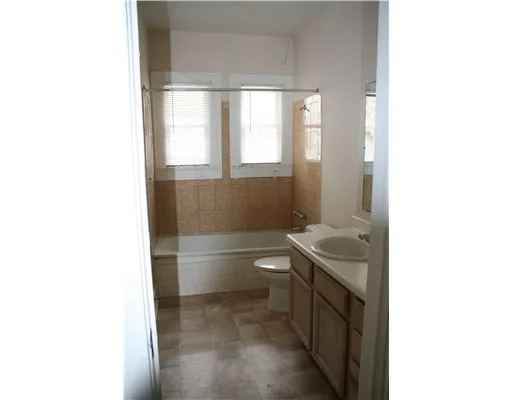 a bathroom with a sink and a bathtub