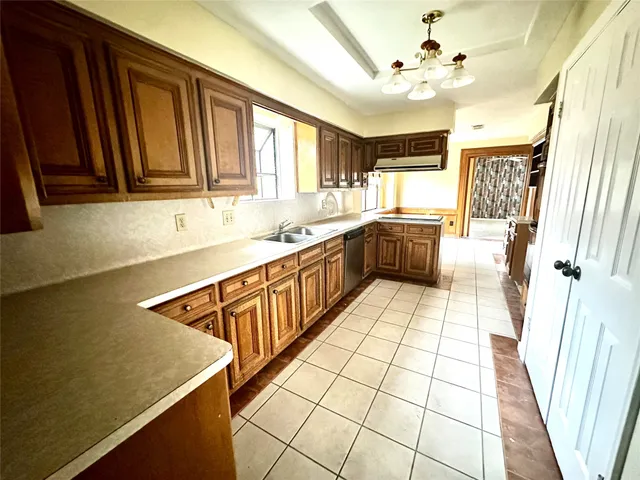 a bathroom with a sink a mirror and a bathtub