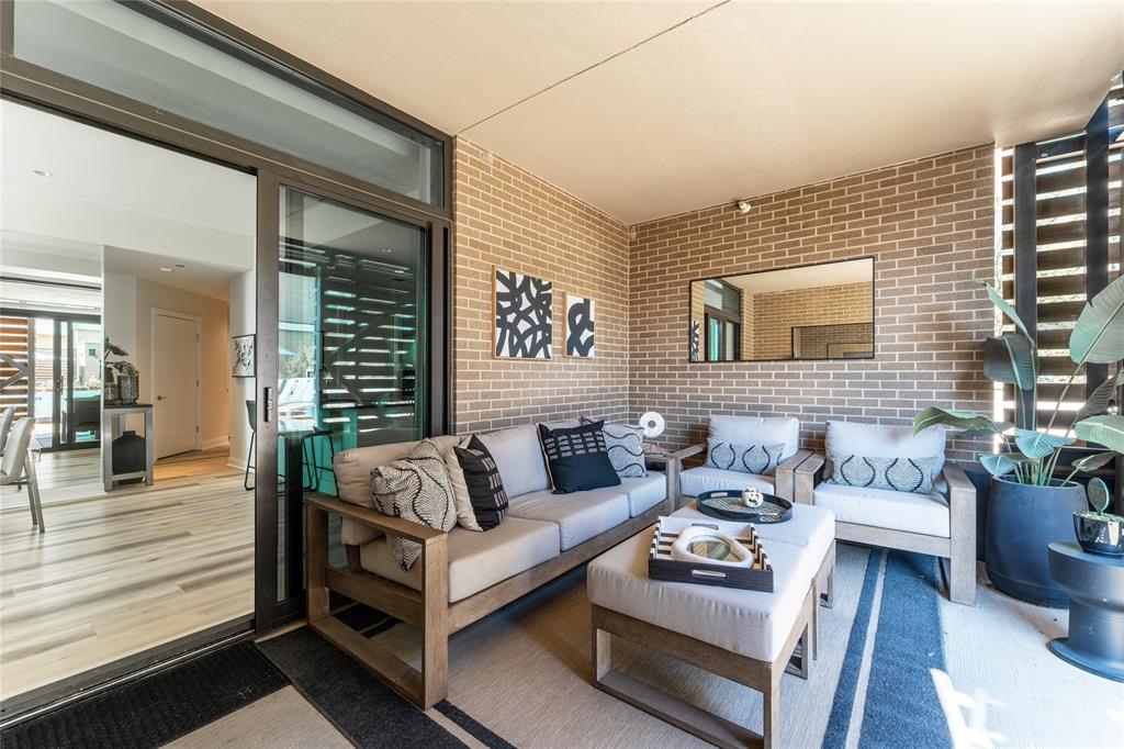5656 North Central Expressway, Unit 207 Dallas, TX 75206 - Photo 11 of 34 a living room with furniture and a large window