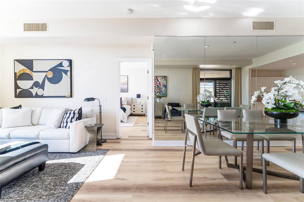 5656 North Central Expressway, Unit 207 Dallas, TX 75206 - Photo 15 of 34 a living room with furniture and flowers