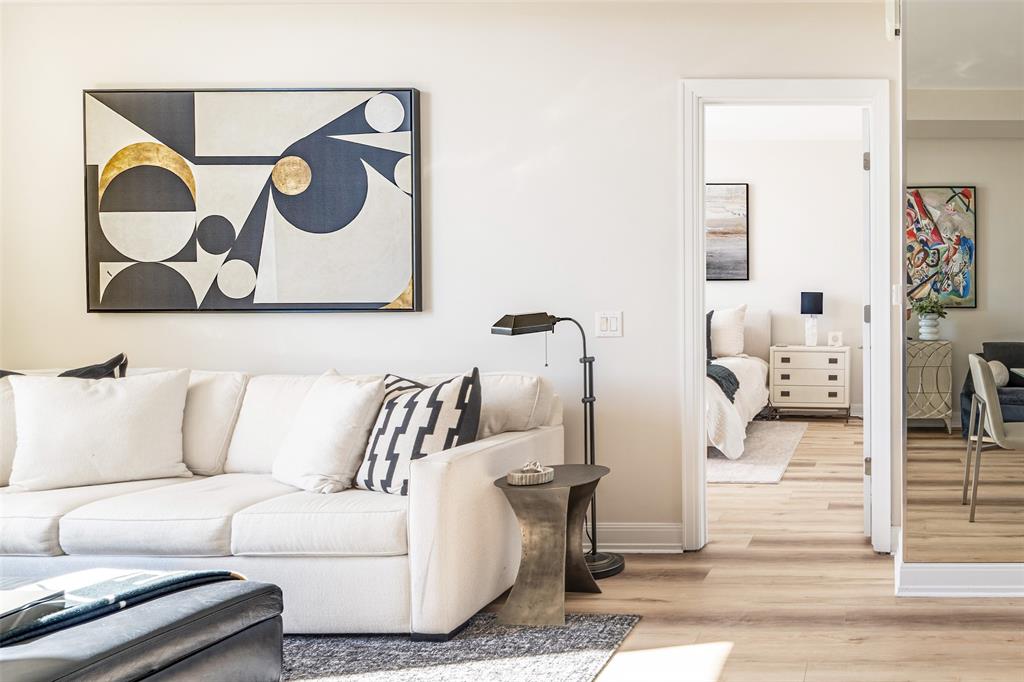 5656 North Central Expressway, Unit 207 Dallas, TX 75206 - Photo 22 of 34 a living room with furniture and wall painting