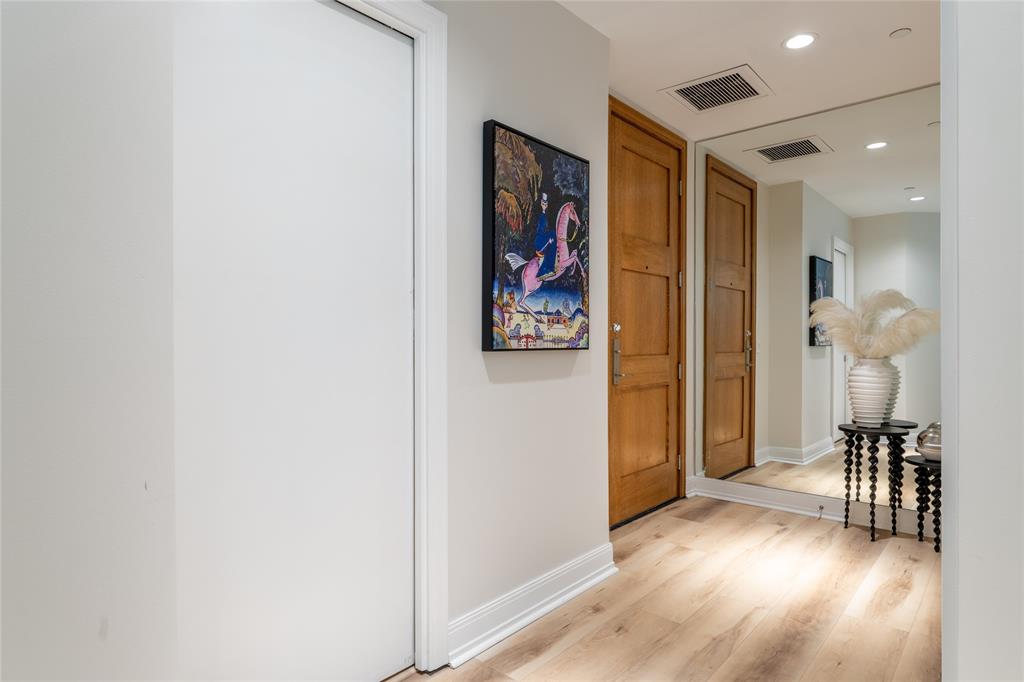 5656 North Central Expressway, Unit 207 Dallas, TX 75206 - Photo 24 of 34 an entryway to room with wooden floor