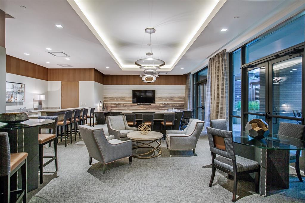 5656 North Central Expressway, Unit 207 Dallas, TX 75206 - Photo 29 of 34 a living room with furniture kitchen view and a large window