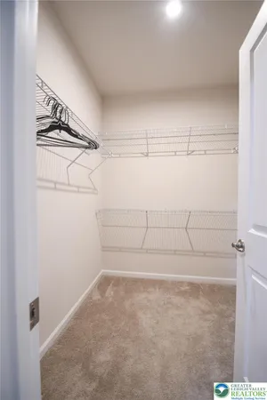 a view of a room with racks on the wall