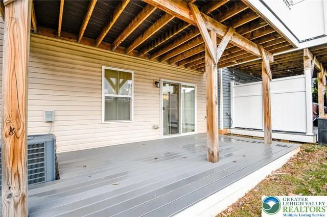 a view of swimming pool with seating space