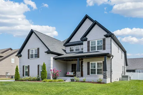 a view of a house with garden
