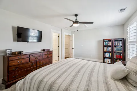 a view of a porch with potted plants
