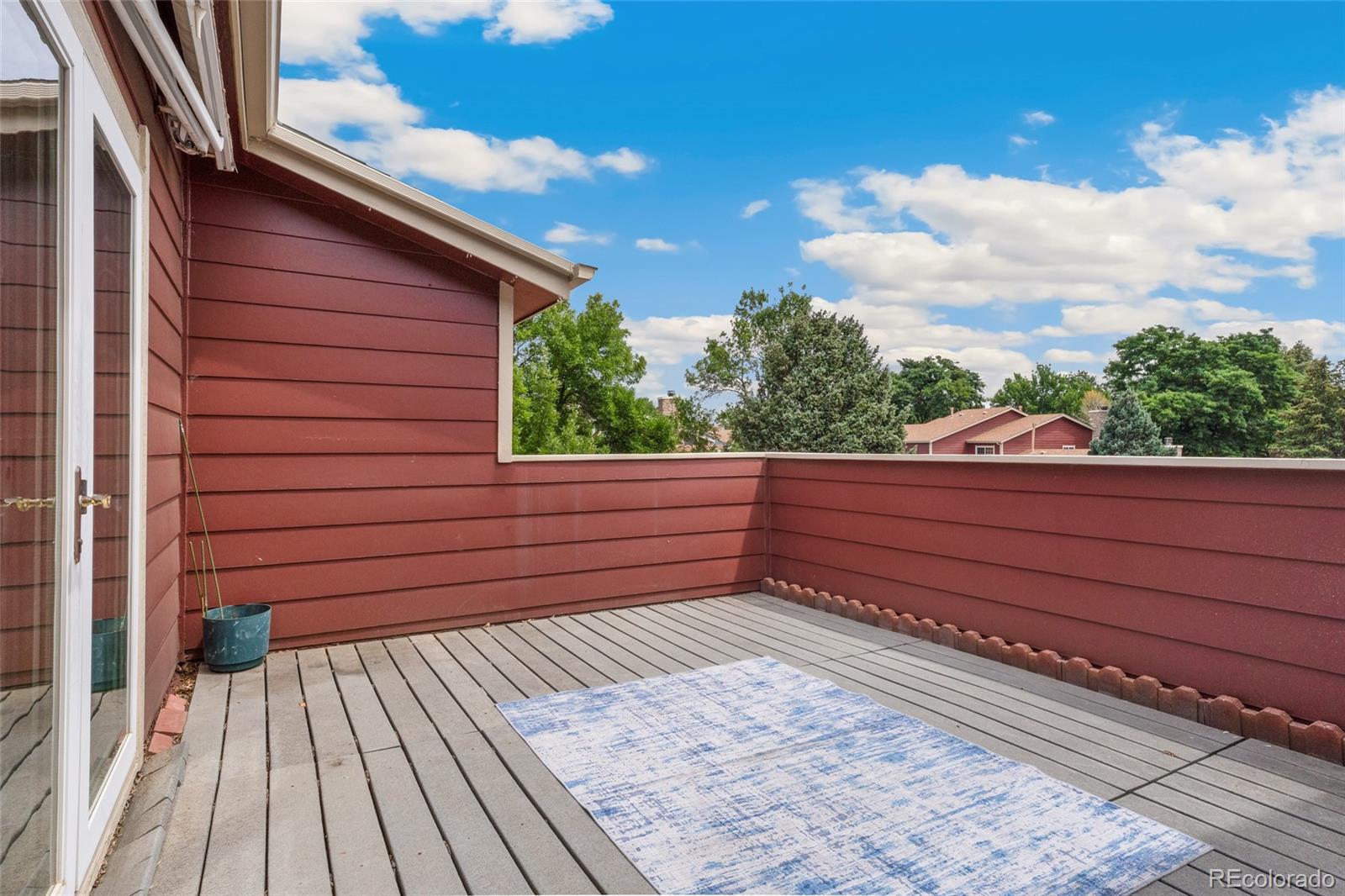 8417 Everett Way, Unit E Arvada, CO 80005 - Photo 24 of 36 a view of a wooden fence