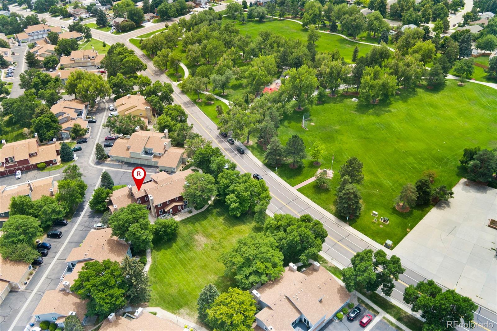 8417 Everett Way, Unit E Arvada, CO 80005 - Photo 33 of 36 an aerial view of residential houses with outdoor space and trees