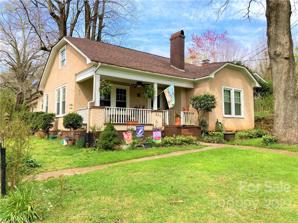 461 North Main Street Rutherfordton, NC 28139 - Photo 1 of 48 a front view of a house with a garden and plants