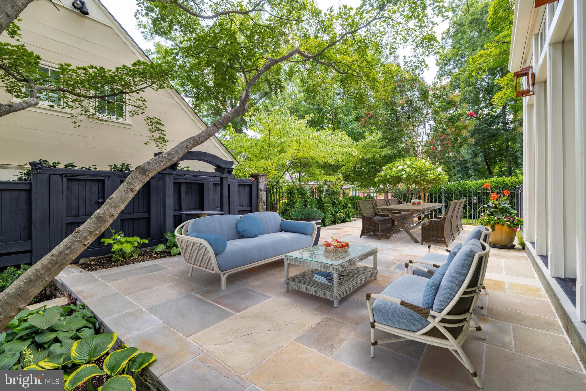 2825 McGill Terrace Northwest Washington, DC 20008 - Photo 17 of 50 a view of a patio with furniture and a backyard