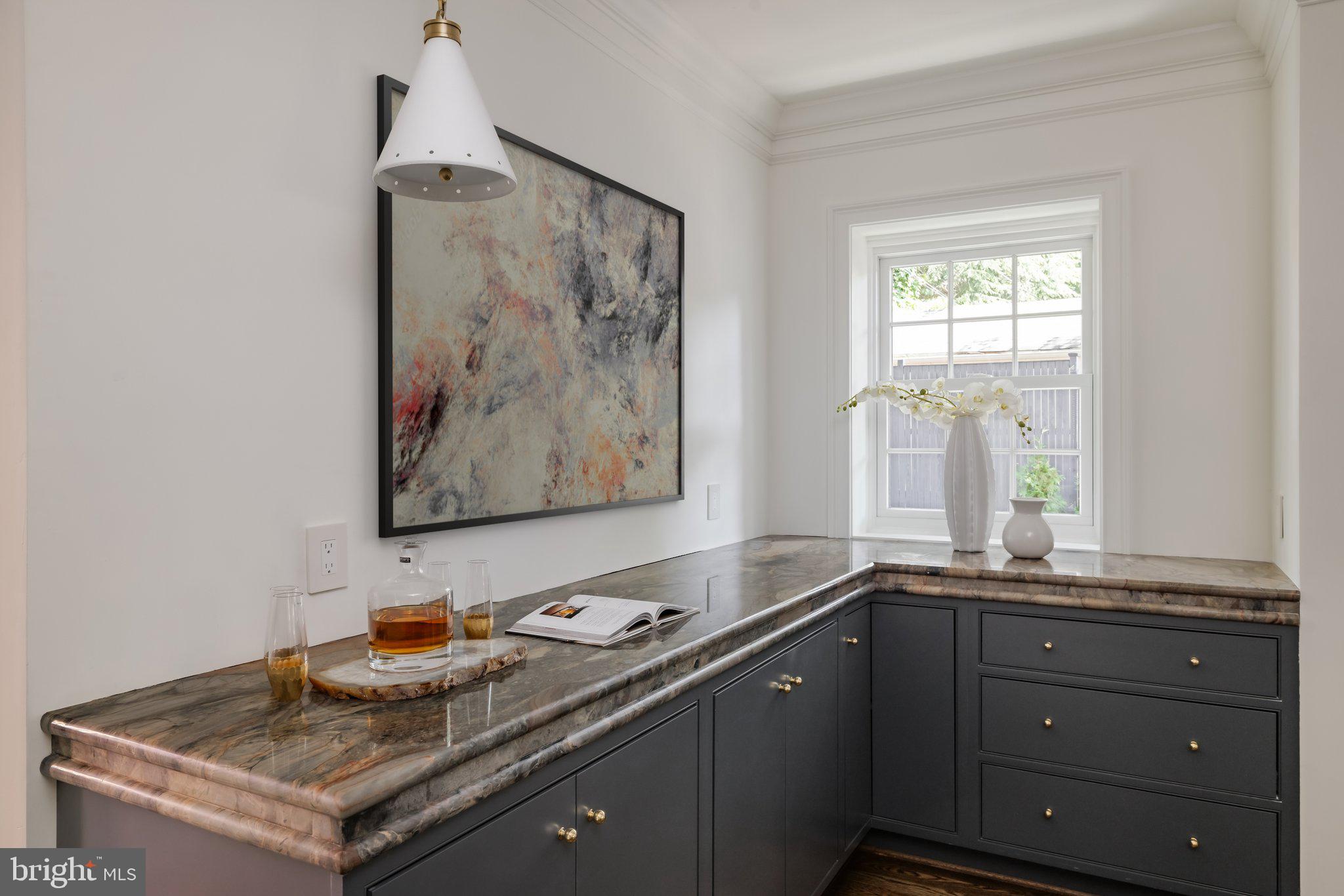 2825 McGill Terrace Northwest Washington, DC 20008 - Photo 22 of 50 a bathroom with a sink and a mirror