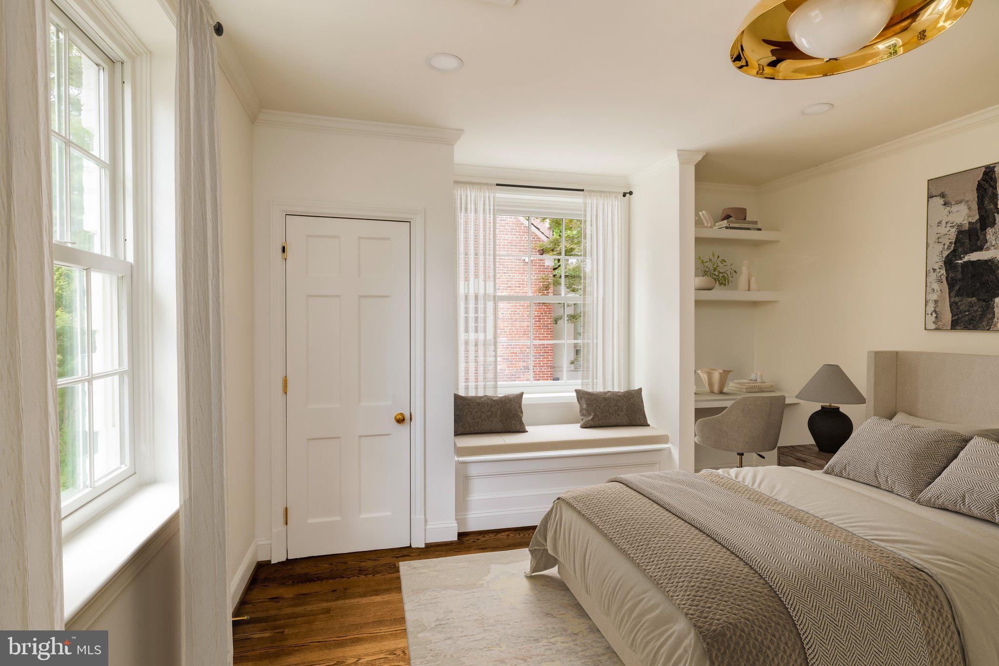 2825 McGill Terrace Northwest Washington, DC 20008 - Photo 34 of 50 a bedroom with a bed and a window
