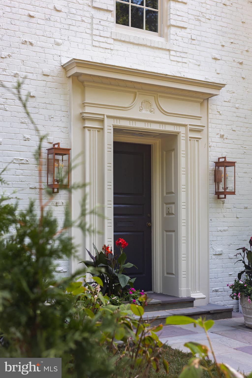 2825 McGill Terrace Northwest Washington, DC 20008 - Photo 4 of 50 a view of front door of house with potted plants