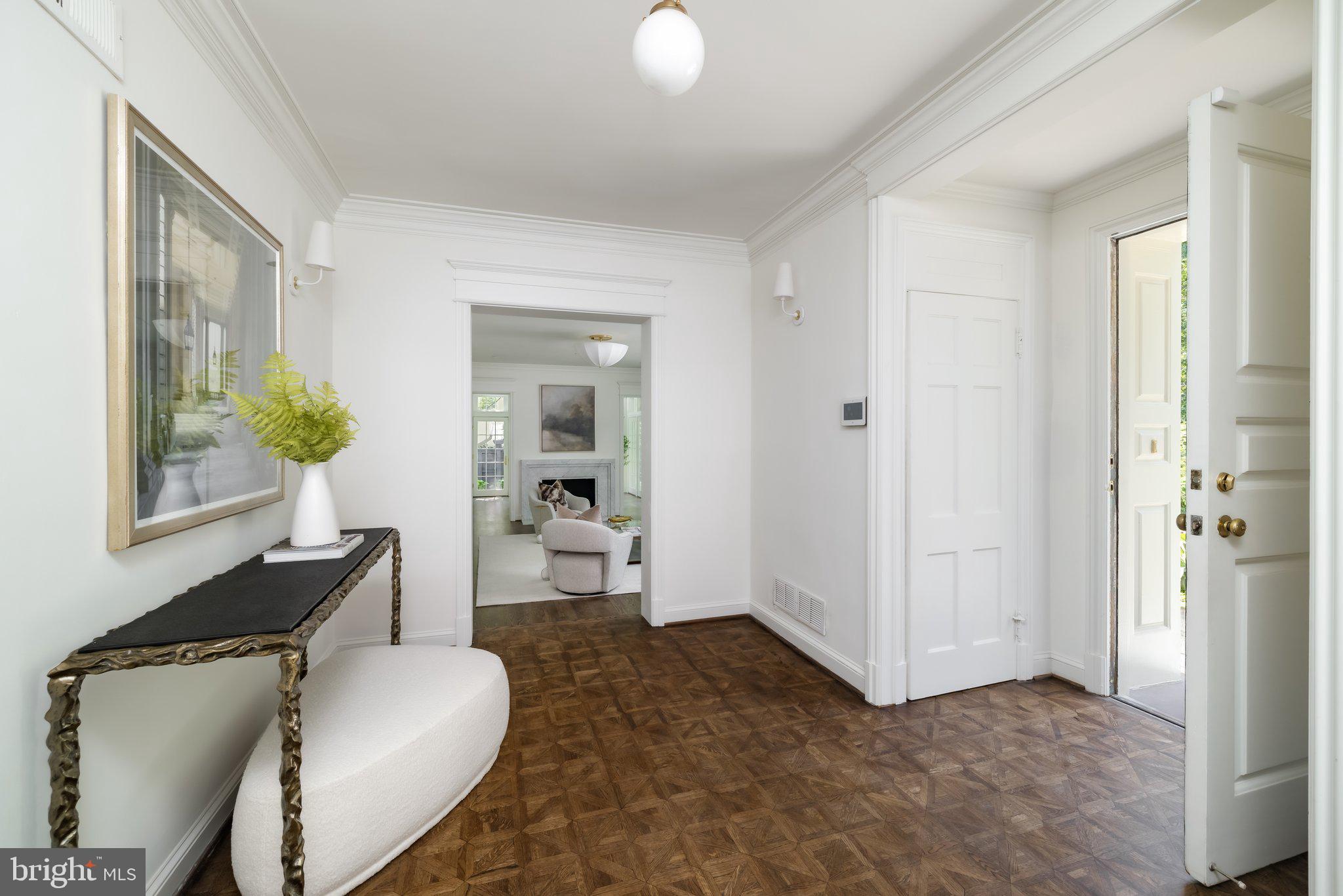2825 McGill Terrace Northwest Washington, DC 20008 - Photo 5 of 50 a living room with furniture and a potted plant