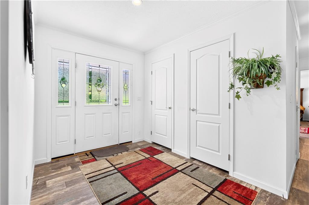 100 Linden Monongahela, PA 15063 - Photo 2 of 41 Gorgeous Lead Glass in Beautiful Front Door and Side Panels.2 Spacious Coat Closets in 12x7 Entry. Quality Luxury Lifeproof Vinyl Flooring throughout!