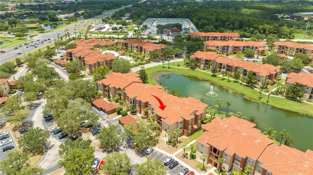 5572 Metrowest Boulevard, Unit 309 Orlando, FL 32811 - Photo 63 of 66 a view of lake