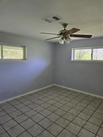 a view of a window in an empty room