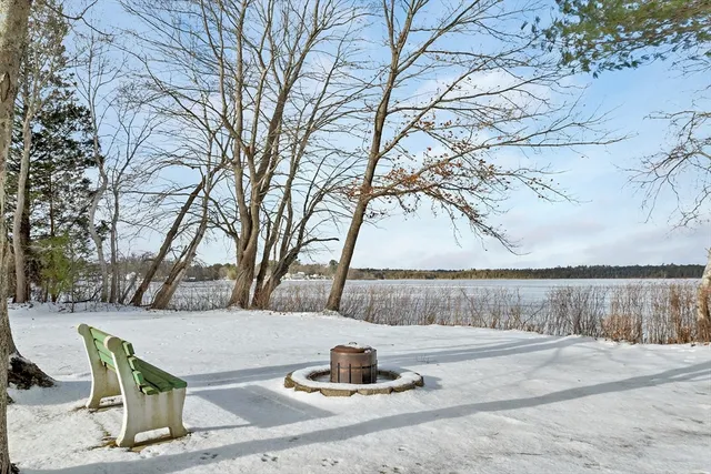 a park view with iron fence