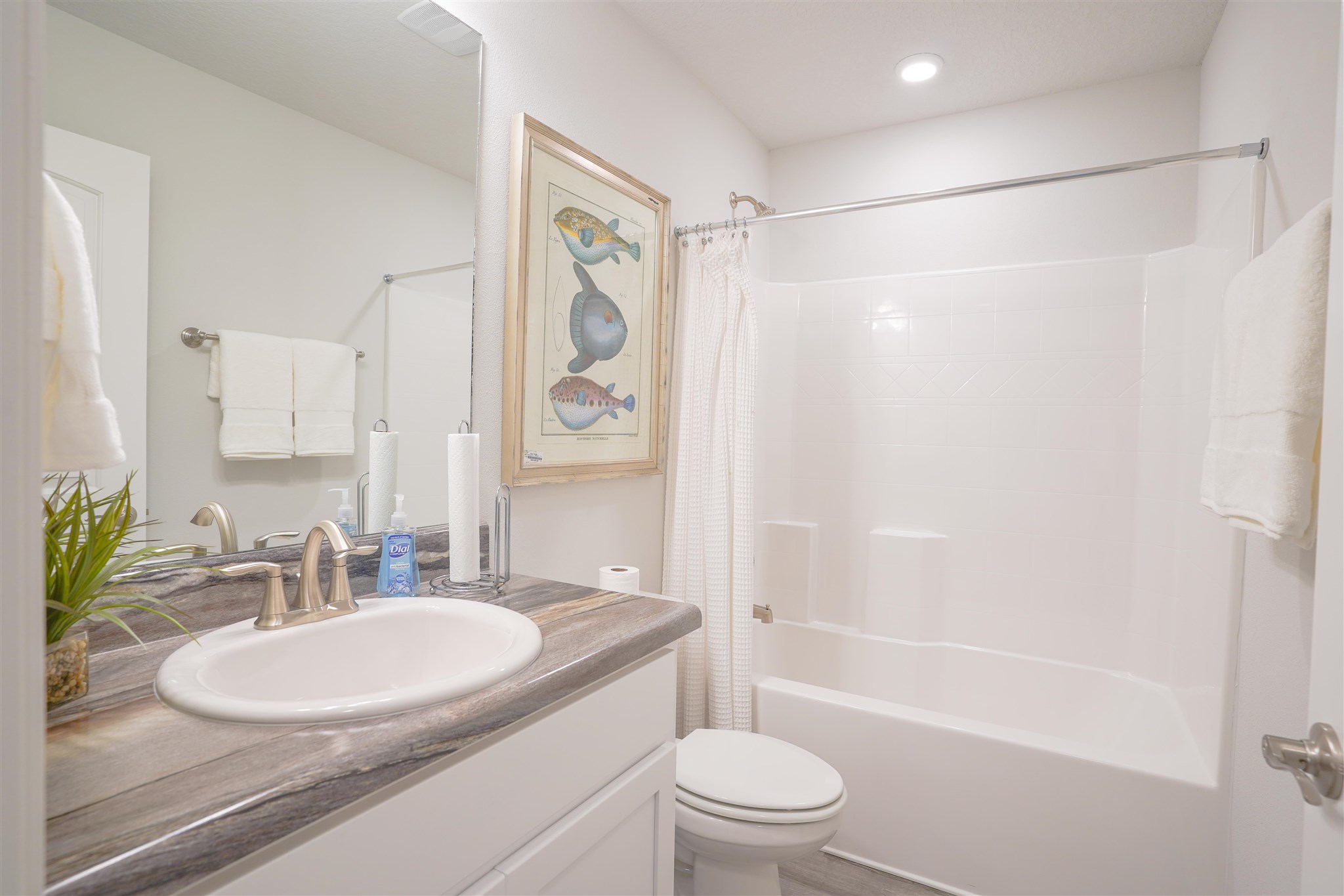 1813 Leigh Loop Cantonment, FL 32533 - Photo 13 of 15 a bathroom with a granite countertop sink toilet and shower
