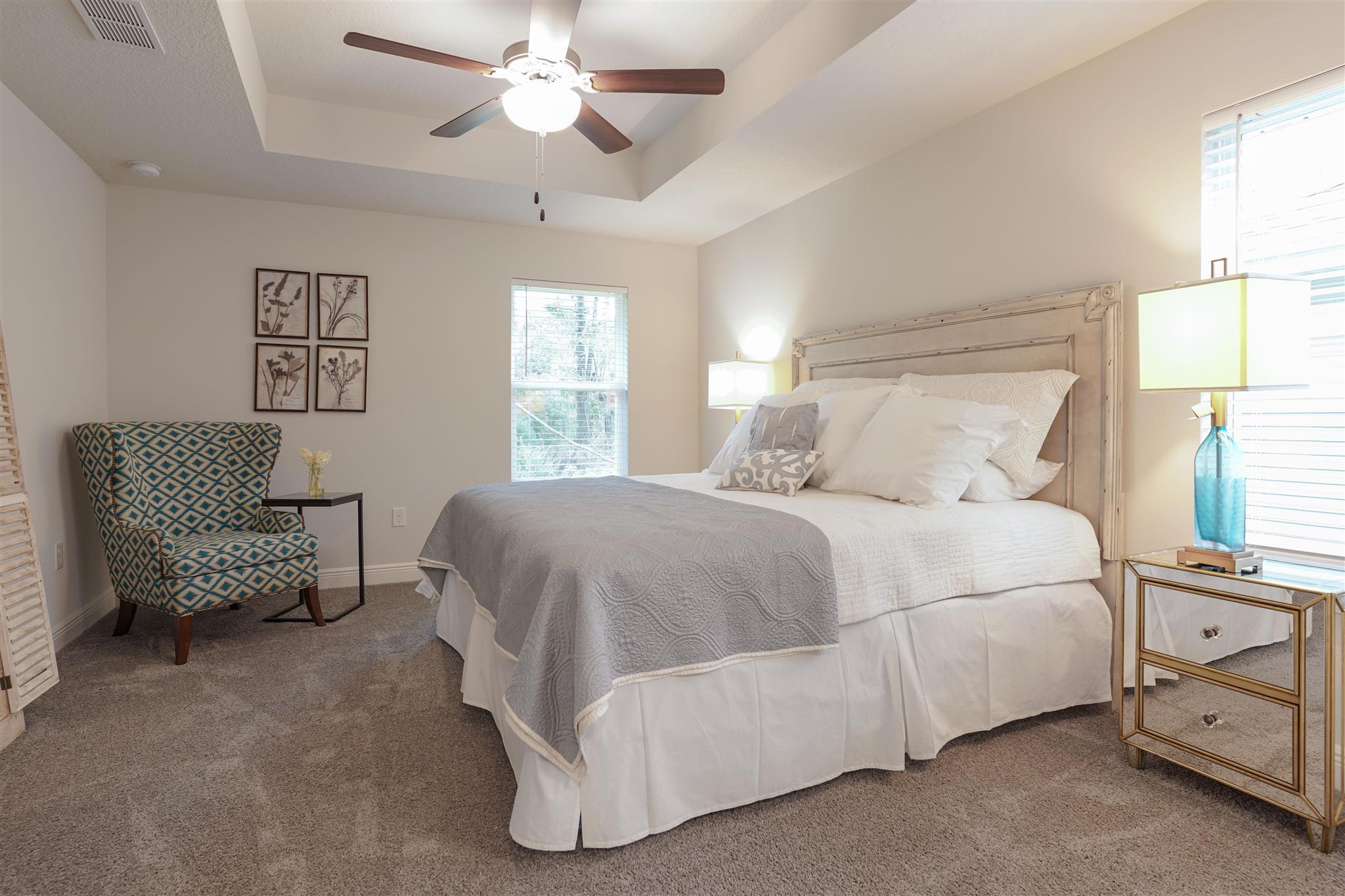 1813 Leigh Loop Cantonment, FL 32533 - Photo 6 of 15 a bedroom with a bed and a chandelier