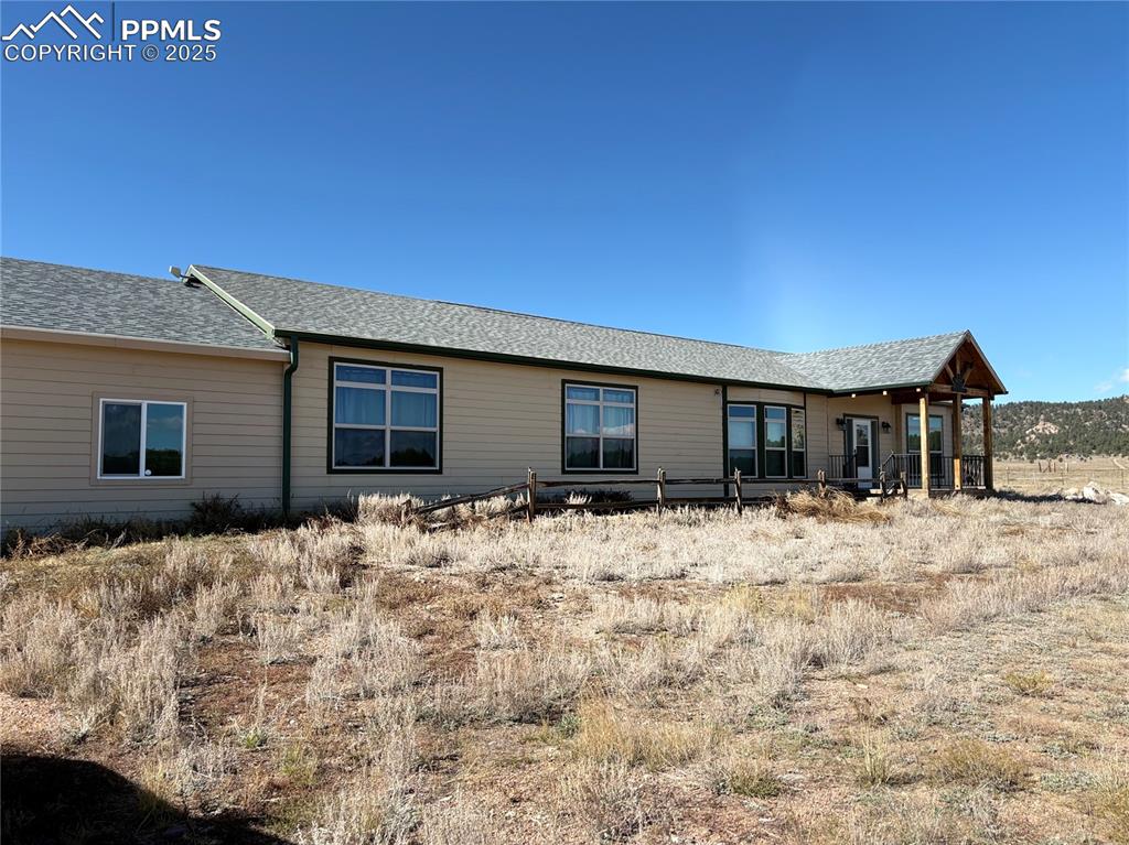 1925 Doe Valley Road Guffey, CO 80820 - Photo 3 of 30 a front view of house with yard