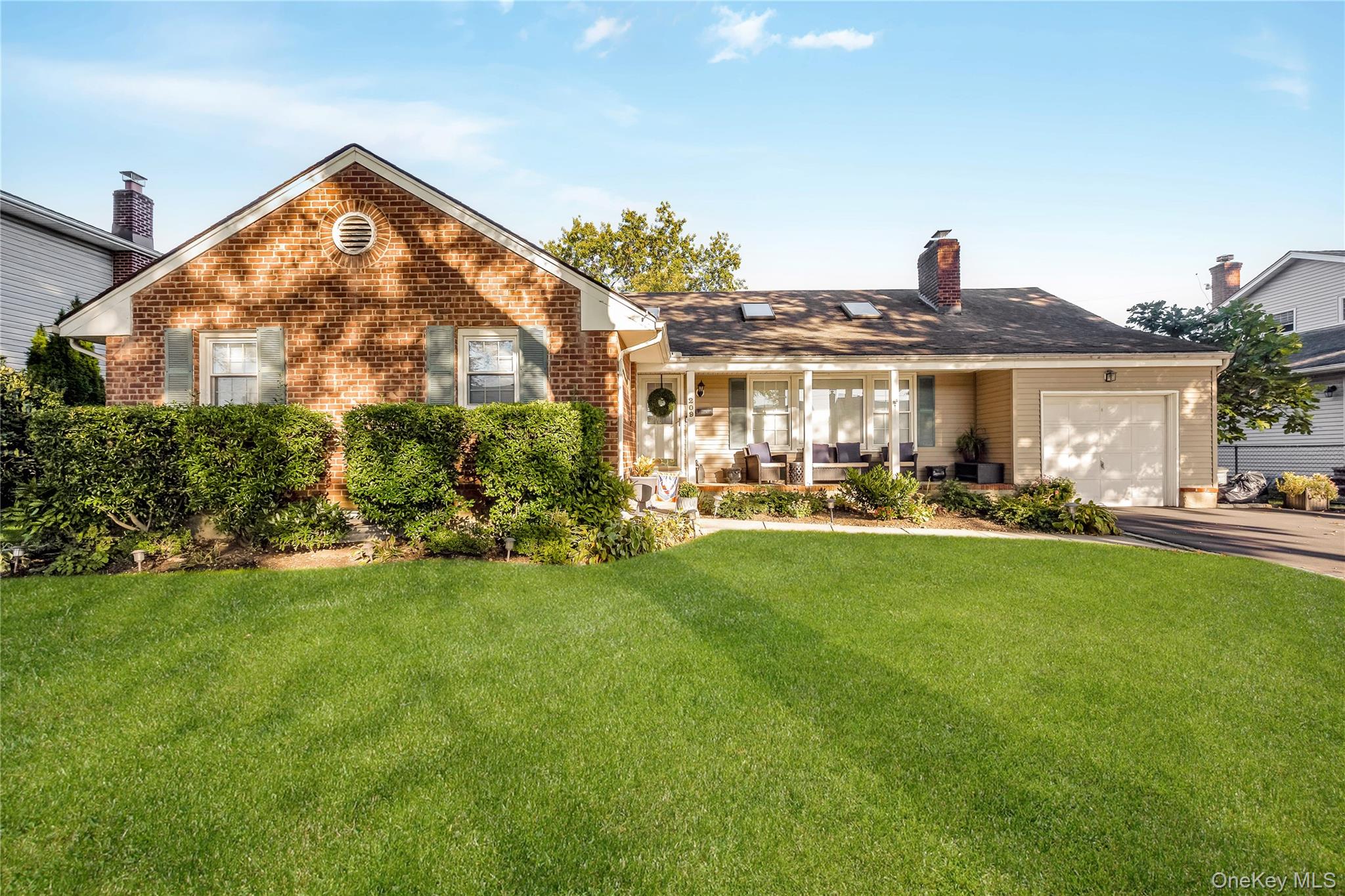 209 Brompton Road Garden City, NY 11530 - Photo 1 of 1 a view of a house with a backyard