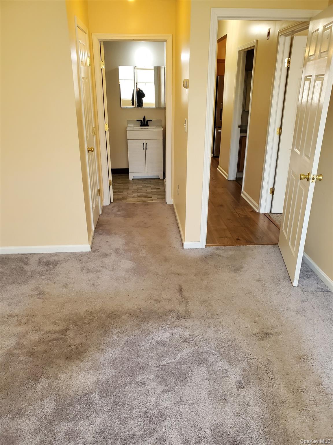 75 Pipetown Hill Road Nanuet, NY 10954 - Photo 8 of 14 a view of a bathroom with a sink and a mirror
