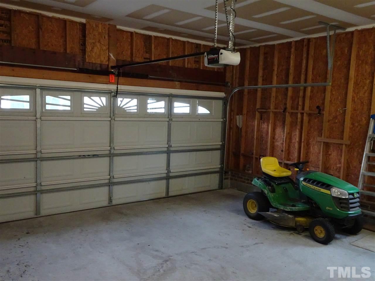 104 West Waycliff Road Henderson, NC 27537 - Photo 22 of 25 Double car garage with front entrance