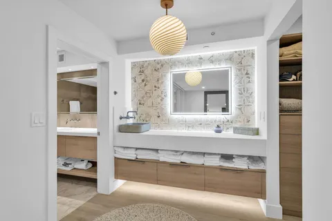 an aerial view of a house with wooden floor