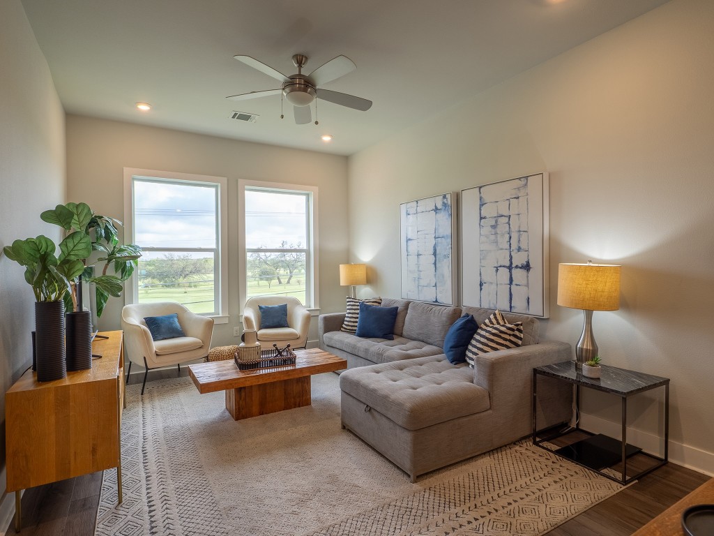 4507 East Martin Luther King Jr Boulevard, Unit 123 Austin, TX 78721 - Photo 7 of 26 Living room with wood finished floors, recessed lighting, and a ceiling fan