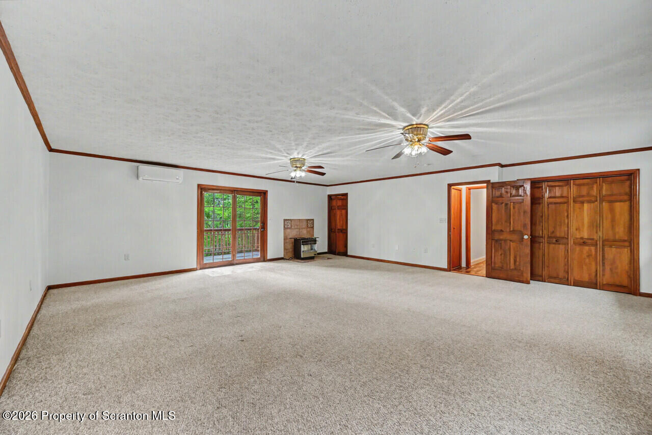 211 Buckingham Street Moscow, PA 18444 - Photo 38 of 83 a view of an empty room with a window