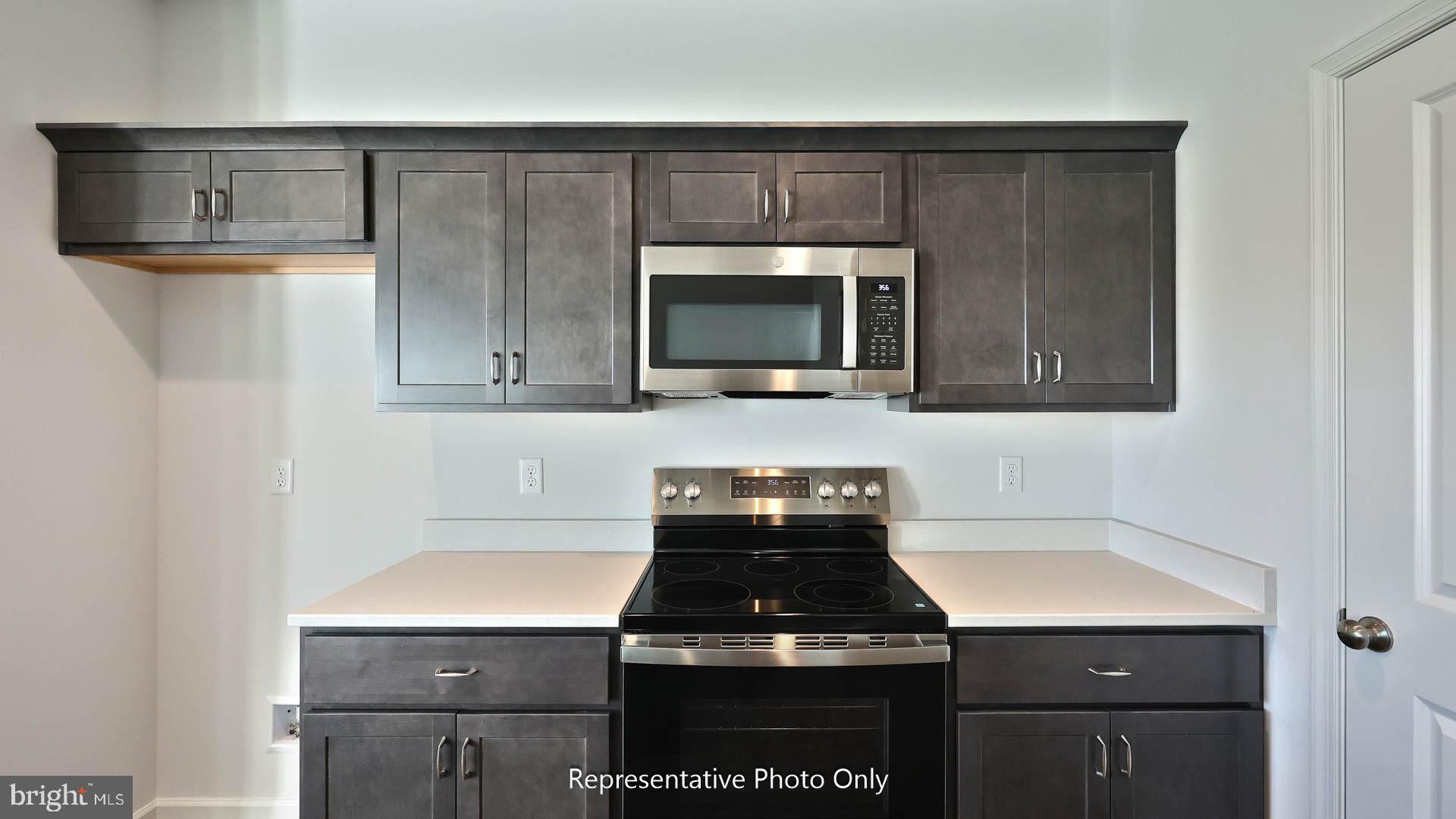 130 Foundry Lane Lebanon, PA 17042 - Photo 8 of 18 a kitchen with a stove and a microwave