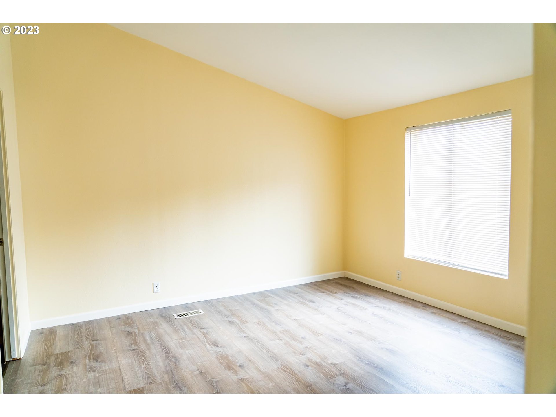 938 Water Street Springfield, OR 97477 - Photo 13 of 28 a view of an empty room and window