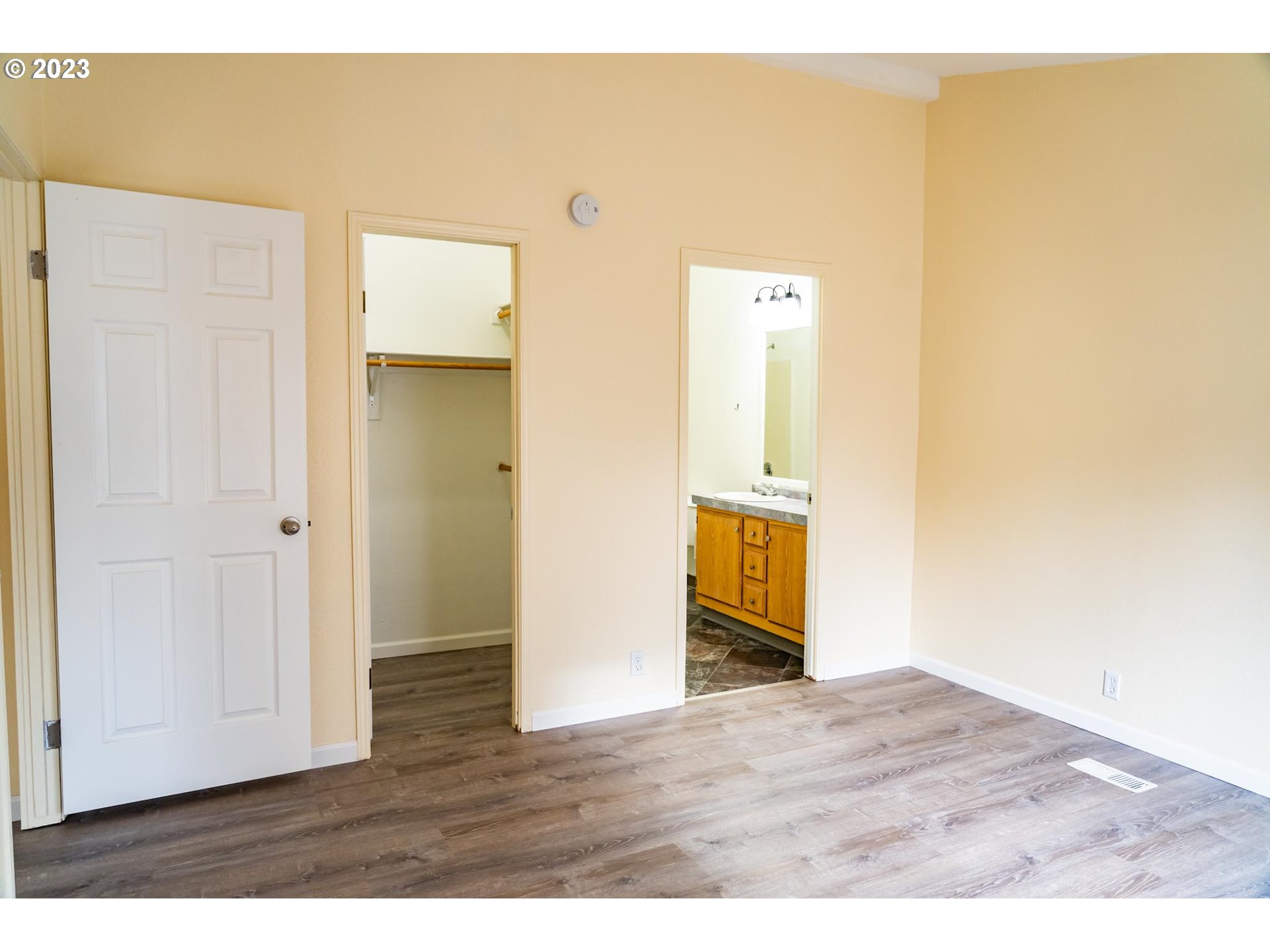 938 Water Street Springfield, OR 97477 - Photo 14 of 28 a room with a wooden floor and bathroom