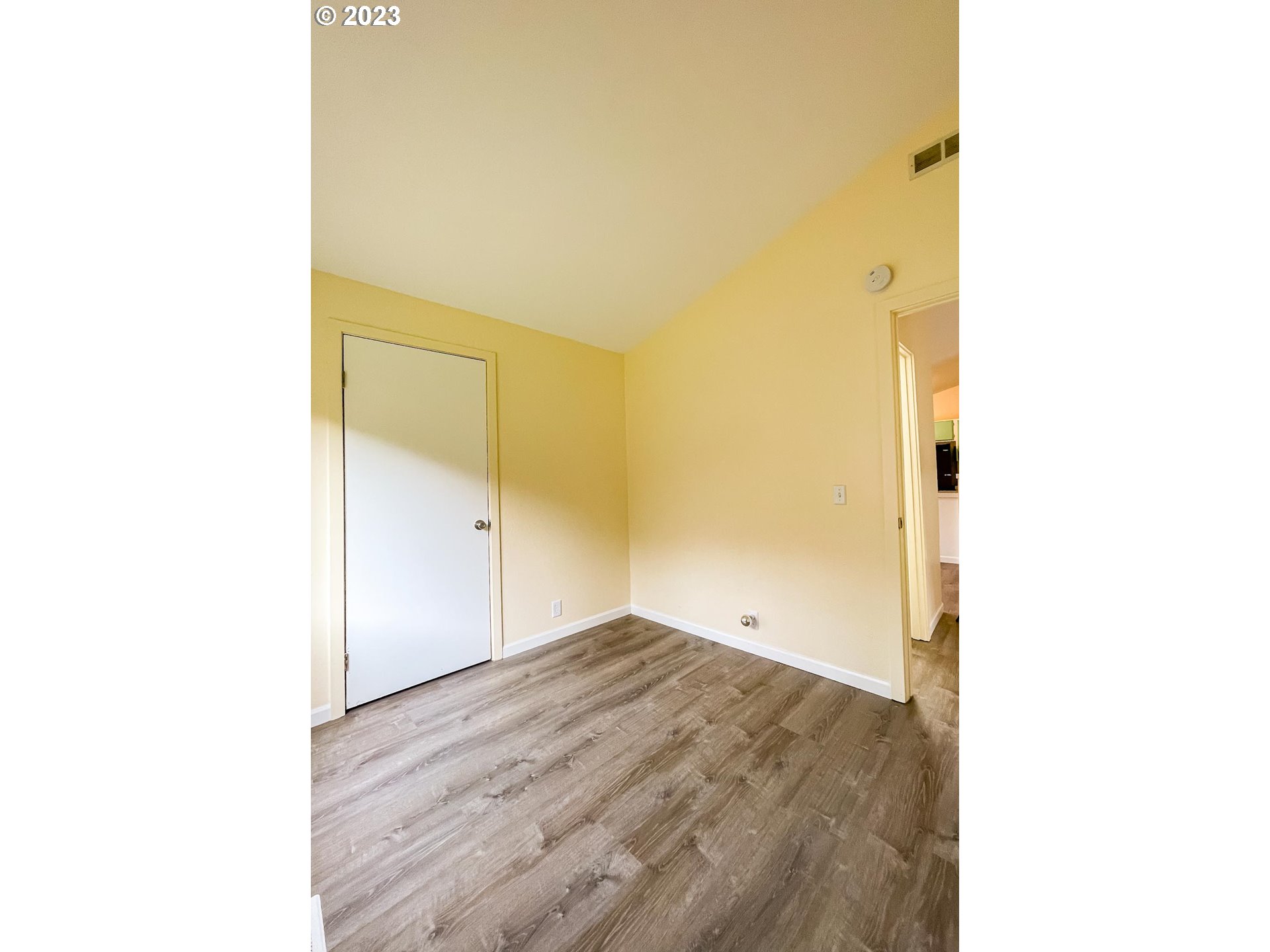 938 Water Street Springfield, OR 97477 - Photo 19 of 28 a view of a room with wooden floor