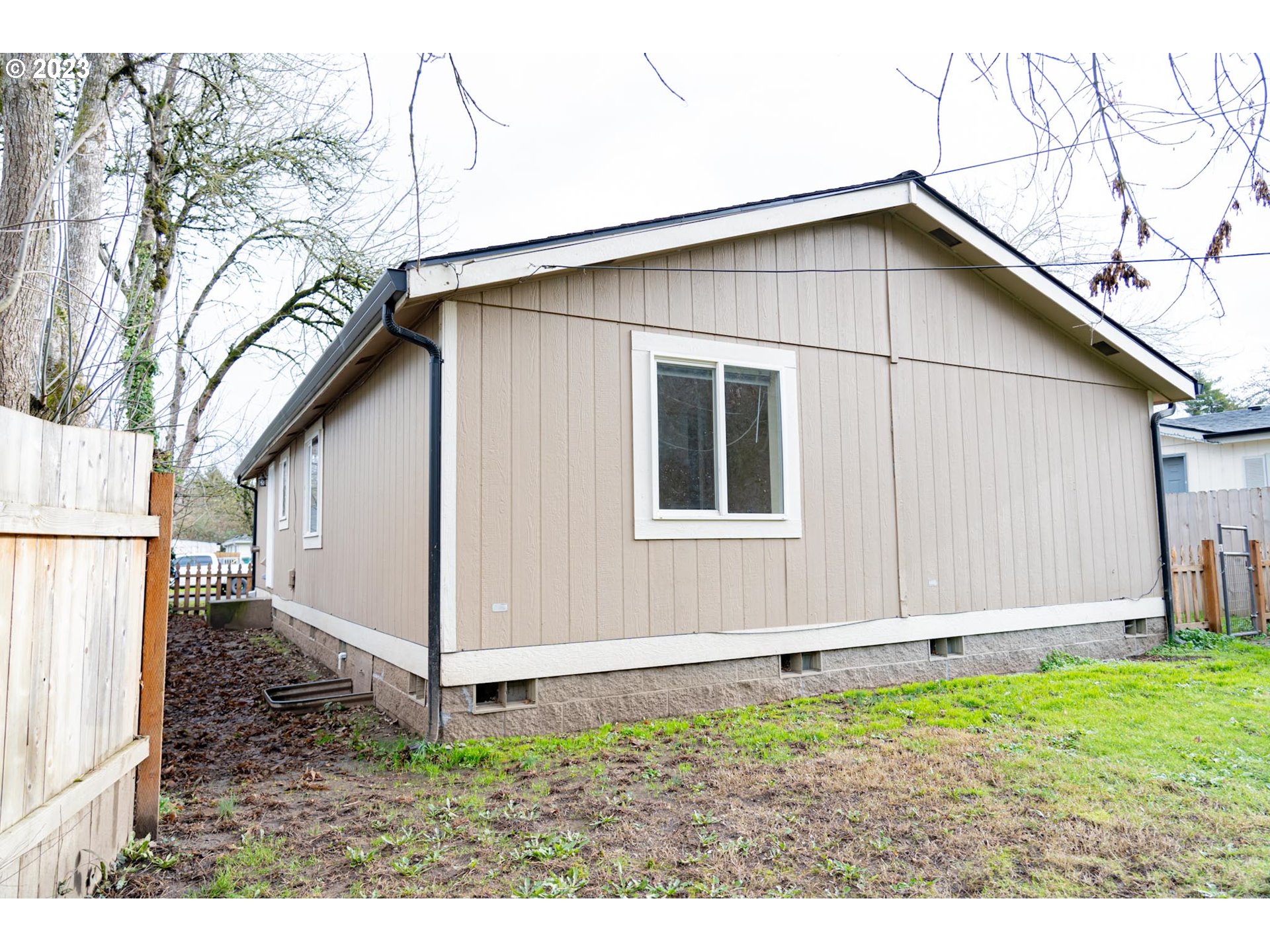 938 Water Street Springfield, OR 97477 - Photo 24 of 28 a backyard of a house with lots of green space
