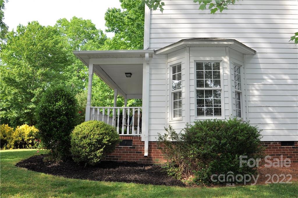 145 Major Fergusons Hill Rutherfordton, NC 28139 - Photo 5 of 31 a front view of a house with garden