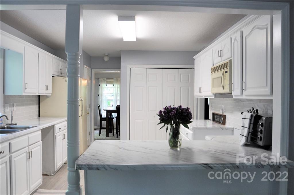 145 Major Fergusons Hill Rutherfordton, NC 28139 - Photo 9 of 31 a kitchen with counter top space and appliances
