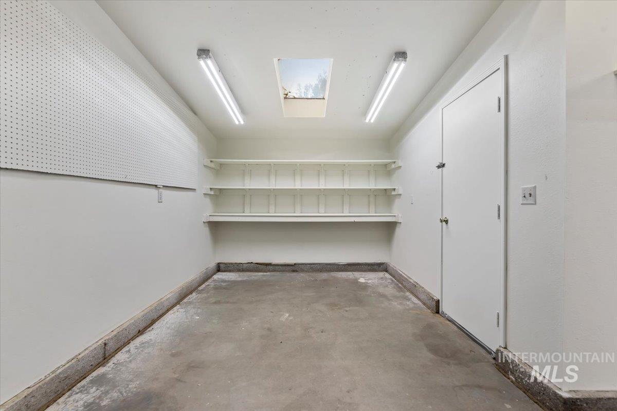 4297 Nystrom Way Boise, ID 83713 - Photo 36 of 50 10x12 shop or storage space featuring a skylight