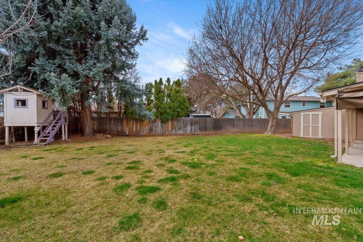 4297 Nystrom Way Boise, ID 83713 - Photo 38 of 50 Fenced backyard with a storage shed